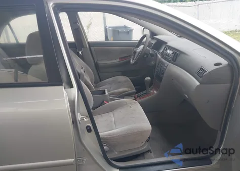 2003 Toyota Corolla Le z USA, uszkodzony, nr VIN JTDBR32EX30047579